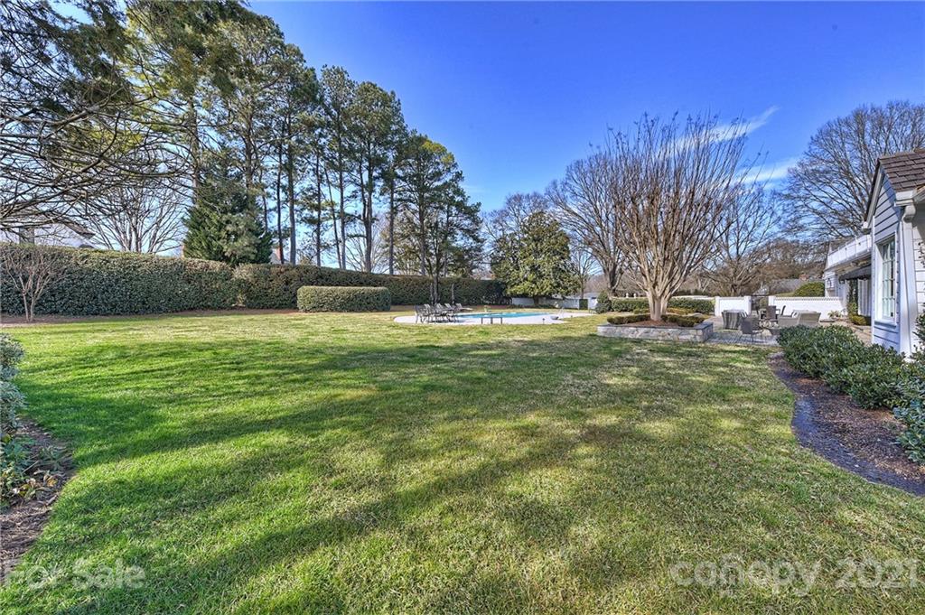 3400 Sharon Road Charlotte, NC 28211 - Photo 31 of 38 a view of a field with trees in the background