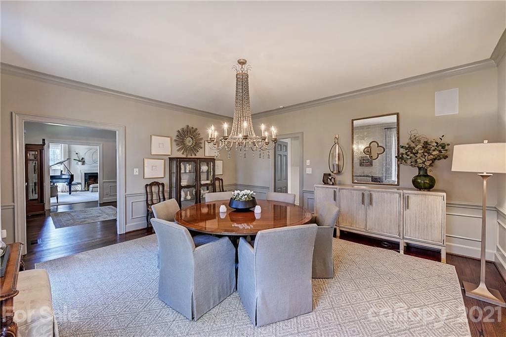 3400 Sharon Road Charlotte, NC 28211 - Photo 5 of 38 a dining room with furniture and chandelier