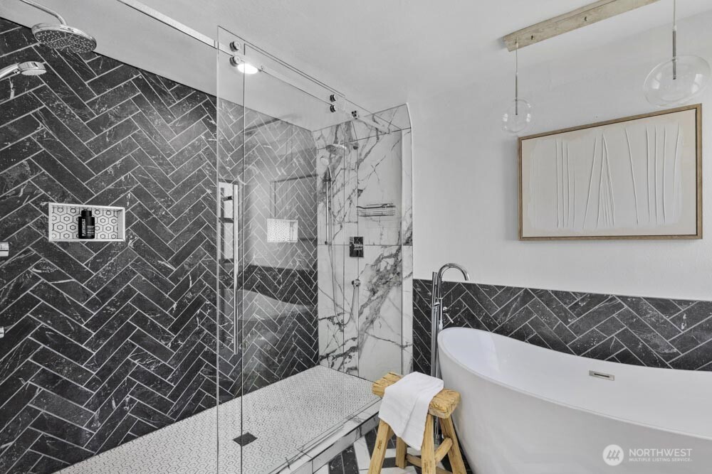 5926 34th Avenue Southwest Seattle, WA 98126 - Photo 13 of 36 a bathroom with a bathtub and a toilet