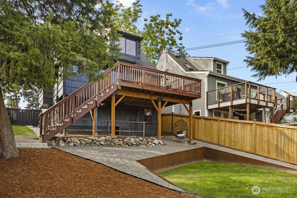 5926 34th Avenue Southwest Seattle, WA 98126 - Photo 27 of 36 front view of a house with a yard