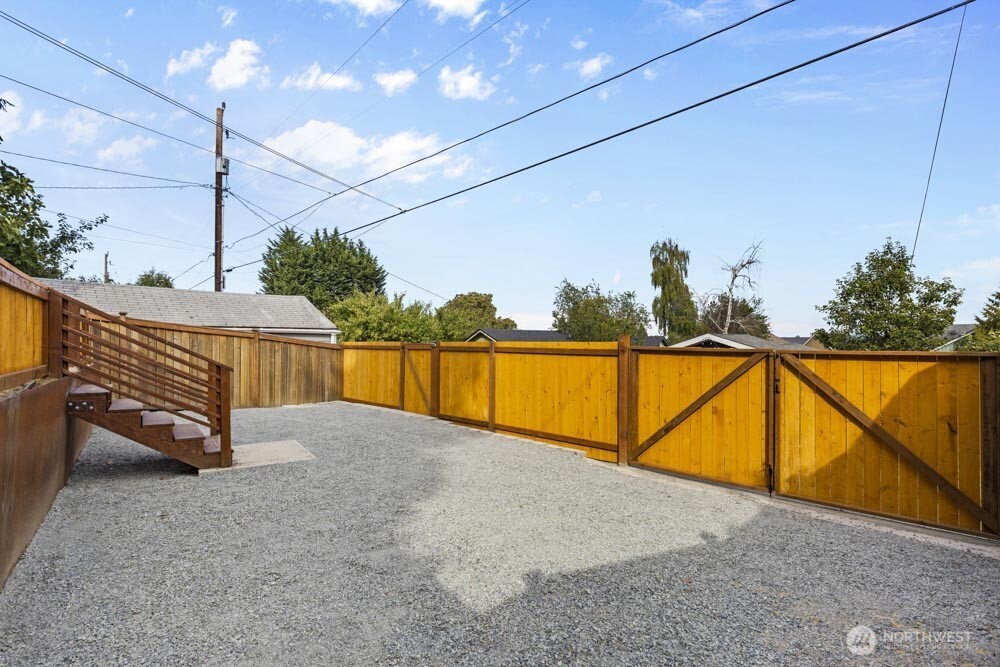5926 34th Avenue Southwest Seattle, WA 98126 - Photo 28 of 36 a view of swimming pool with outdoor space and seating area