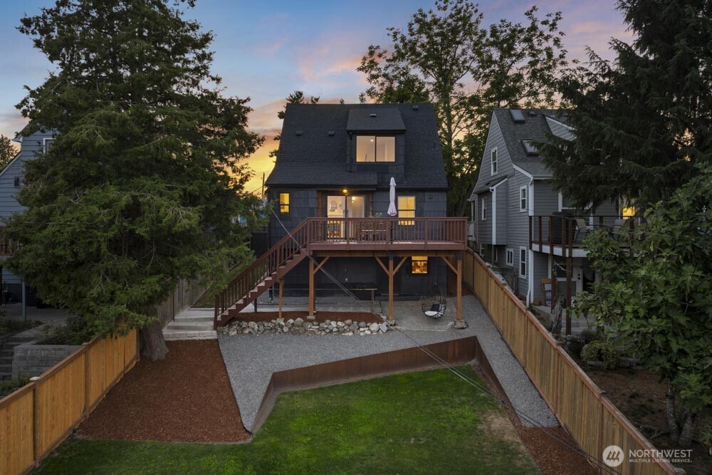 5926 34th Avenue Southwest Seattle, WA 98126 - Photo 33 of 36 a view of a house with a small yard