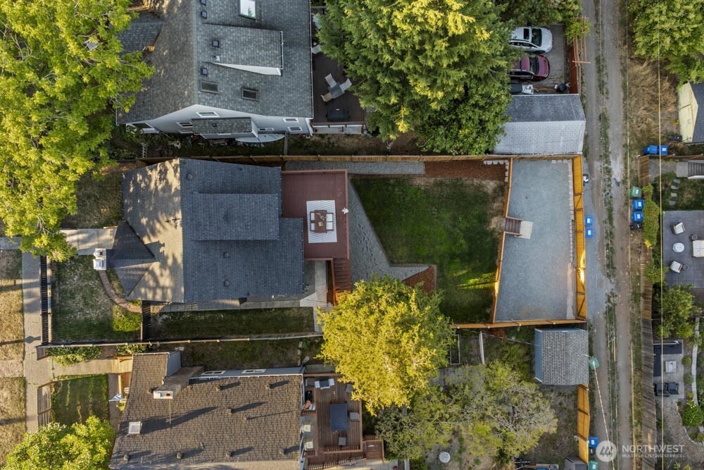 5926 34th Avenue Southwest Seattle, WA 98126 - Photo 35 of 36 an aerial view of a house with a yard