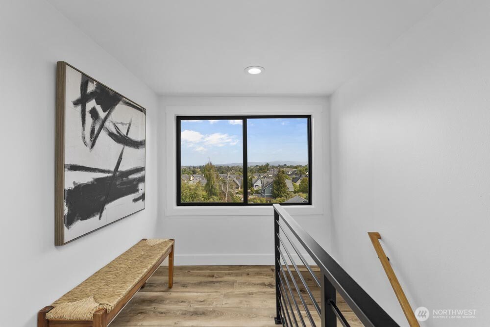 5926 34th Avenue Southwest Seattle, WA 98126 - Photo 9 of 36 a view of a hallway with furniture and window