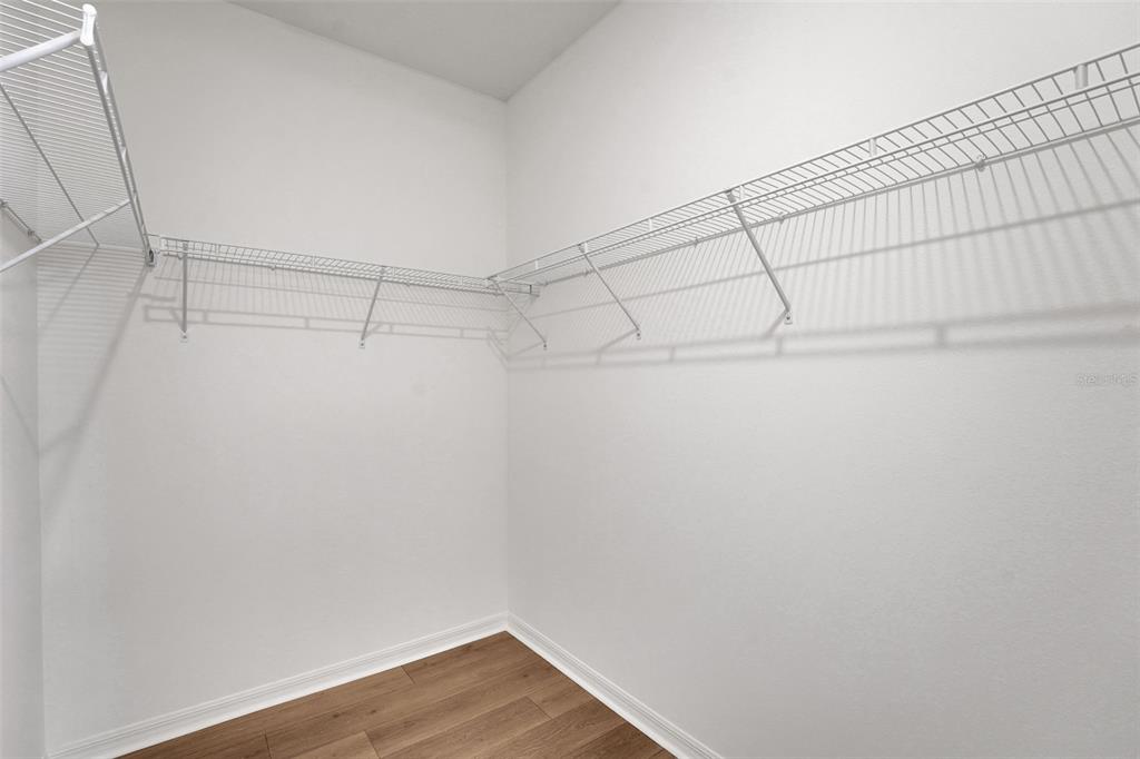 35151 Tuscan Hill Road Dade City, FL 33525 - Photo 25 of 38 a view of a room with racks on the wall