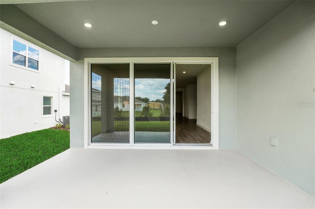 35151 Tuscan Hill Road Dade City, FL 33525 - Photo 34 of 38 a view of a big room with windows and entryway