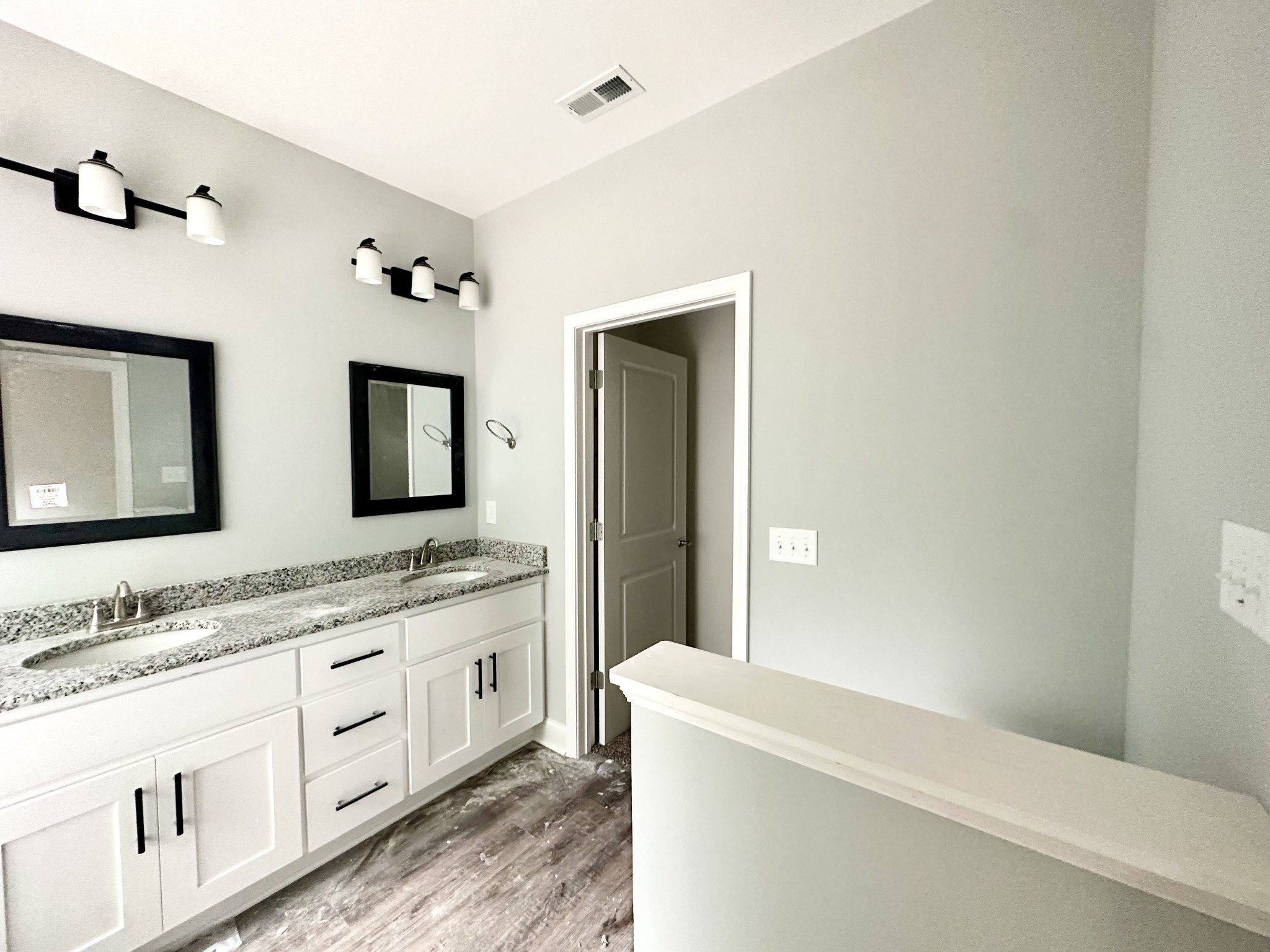 167 Providence Road Pelham, TN 37366 - Photo 9 of 15 a bathroom with a granite countertop sink mirror and bathtub