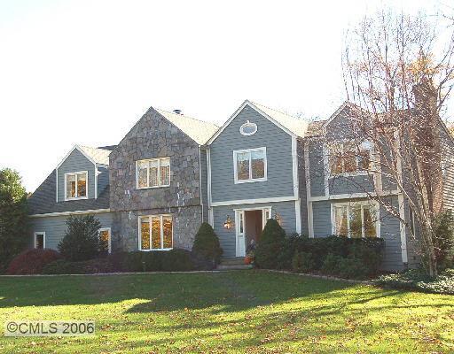 195 Hulls Farm Road Fairfield, CT 06890 - Photo 1 of 1 a view of a house with a yard