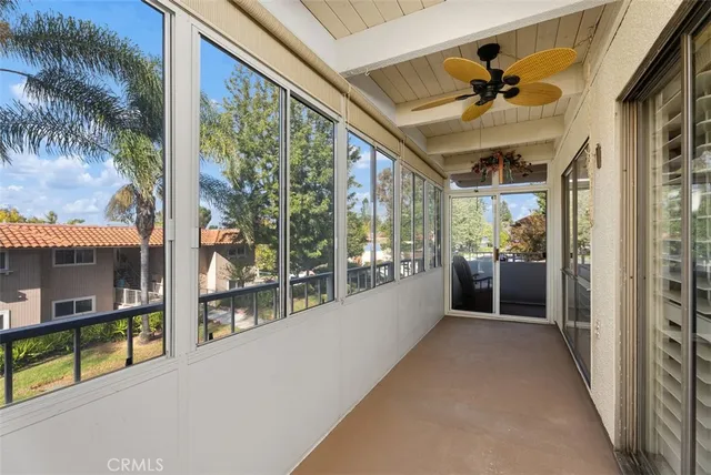 a view of a porch and garden