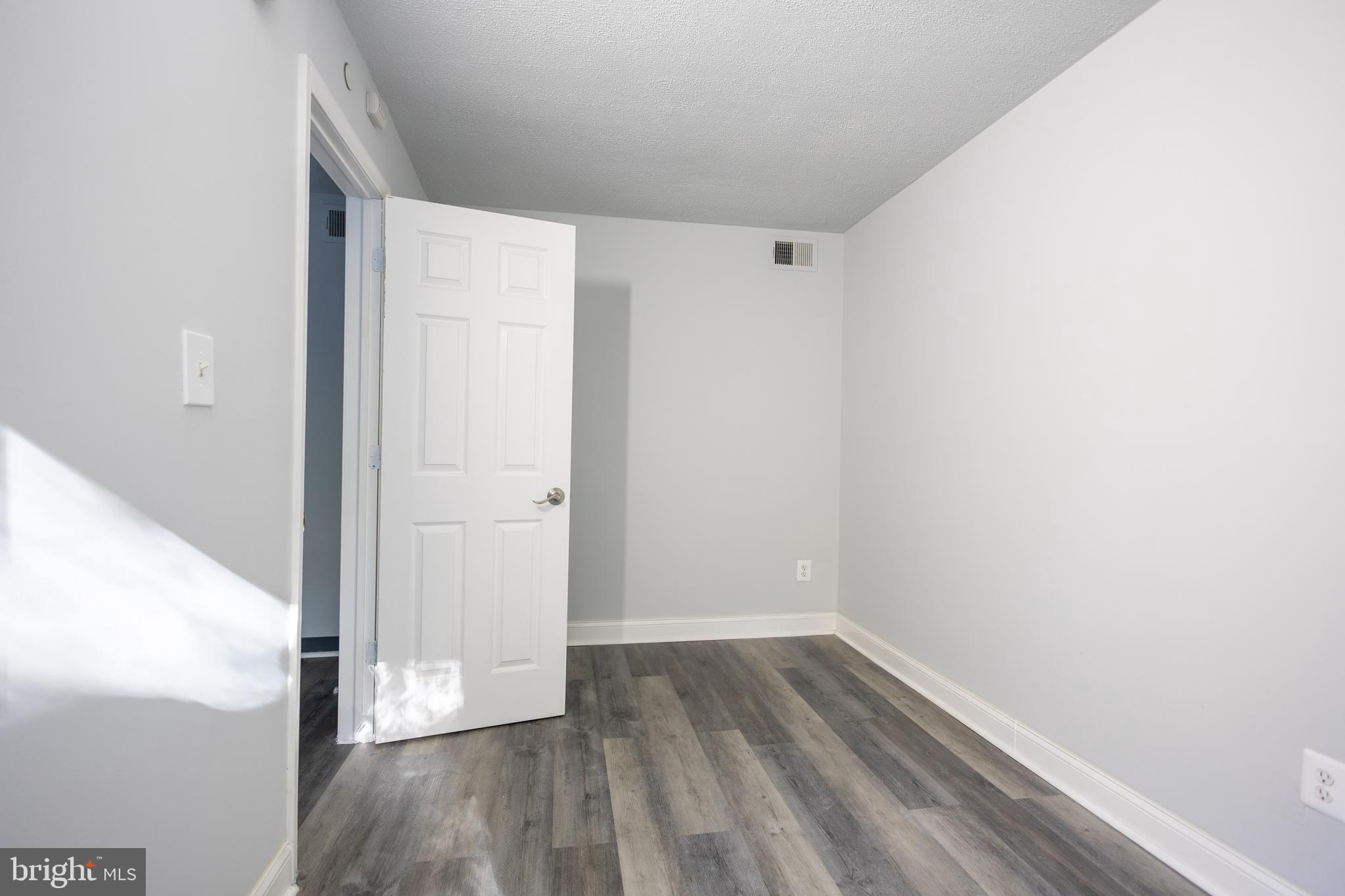 1300-1302 Morris Road Southeast, Unit A6 Washington, DC 20020 - Photo 6 of 13 a view of wooden floor