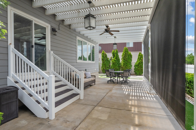 955 Delorean Lane Midvale, UT 84047 - Photo 42 of 47 Covered patio with concrete flooring