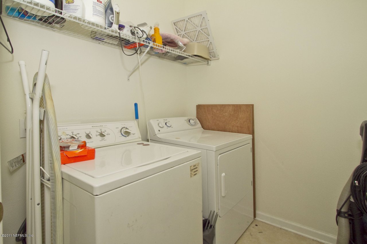 12925 Spring Rain Road Jacksonville, FL 32258 - Photo 14 of 17 a utility room with dryer and washer