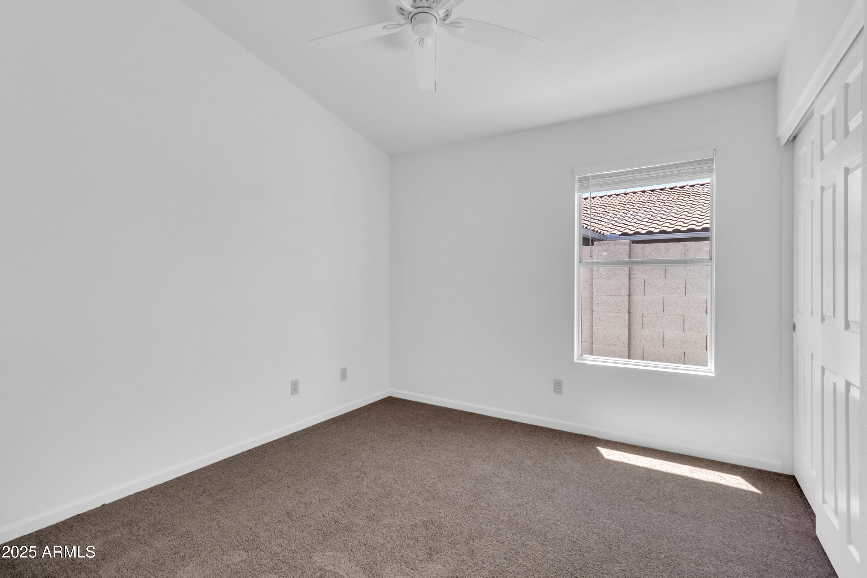 1511 West Wildhorse Court Chandler, AZ 85286 - Photo 13 of 31 an empty room with a window
