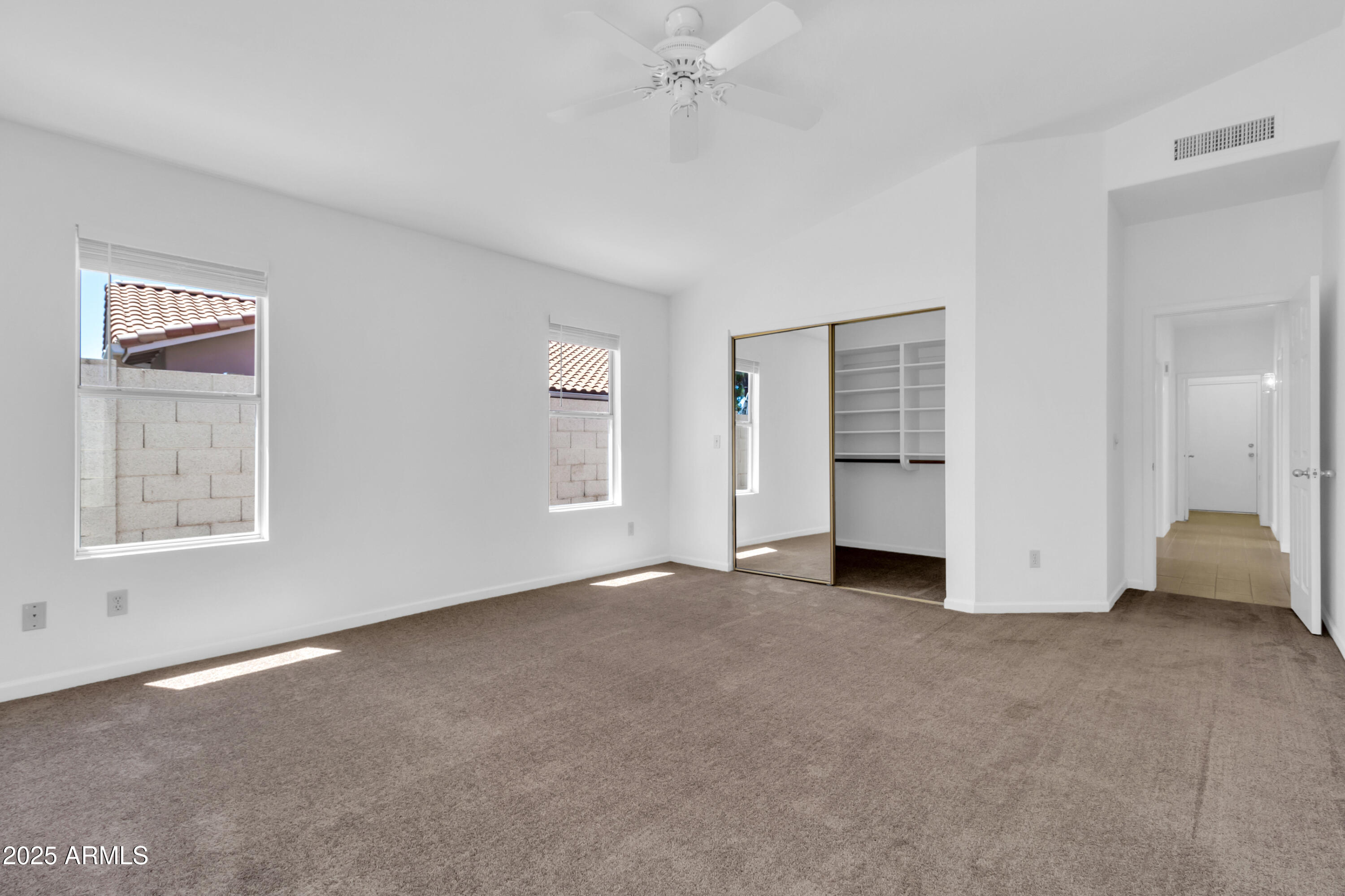 1511 West Wildhorse Court Chandler, AZ 85286 - Photo 16 of 31 an empty room with windows and closet