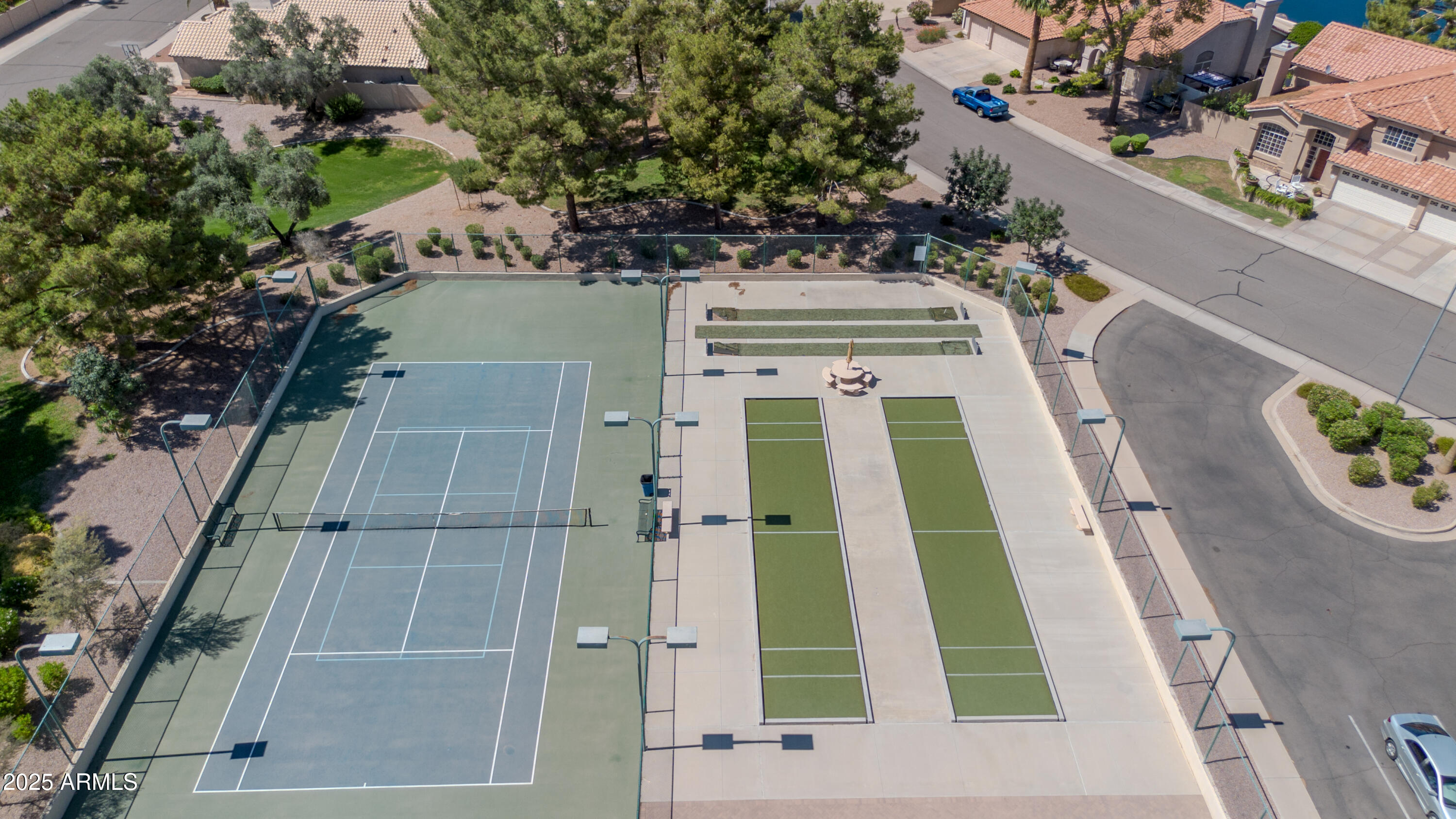 1511 West Wildhorse Court Chandler, AZ 85286 - Photo 28 of 31 an aerial view of a residential apartment building with a yard