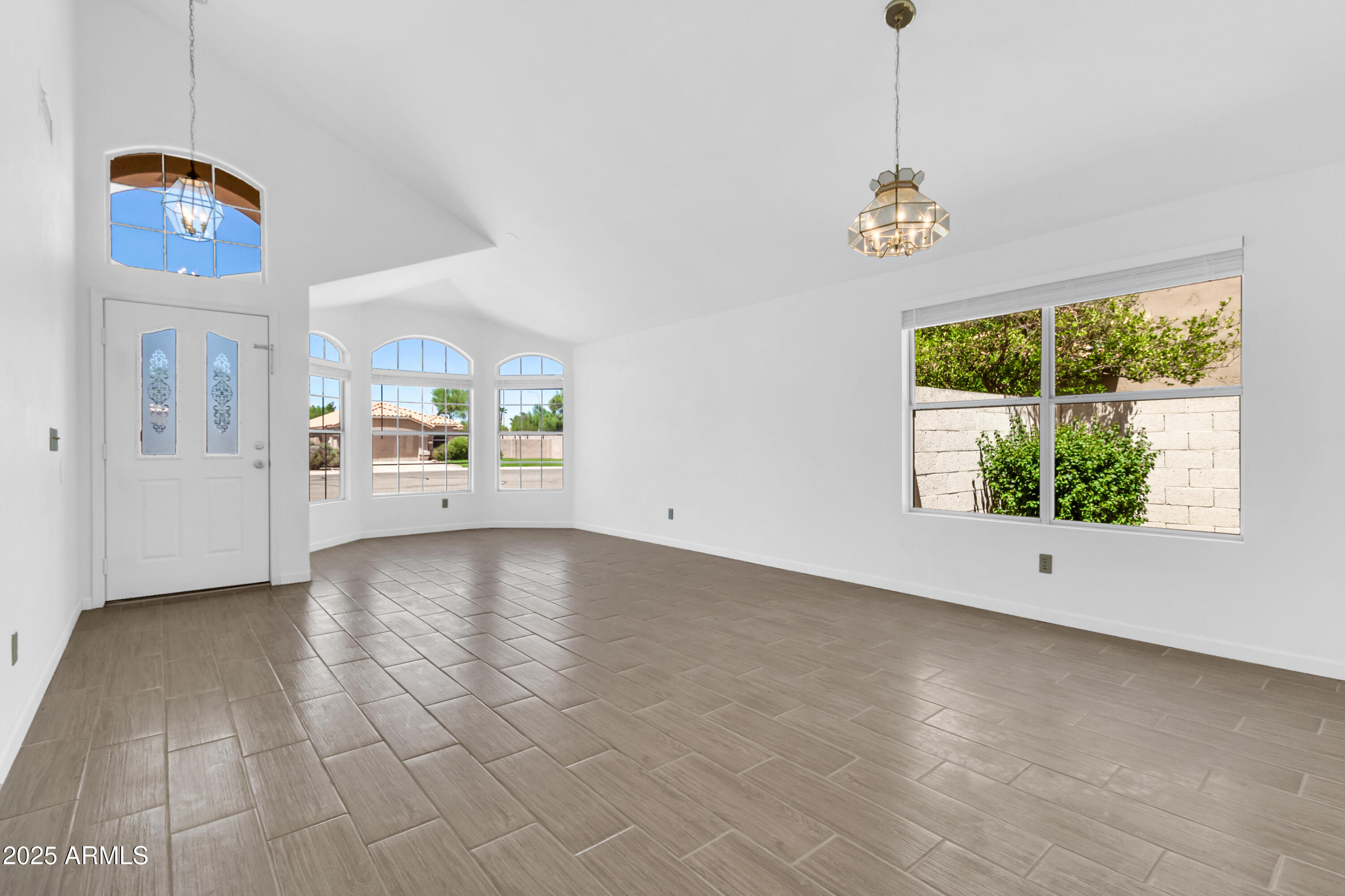 1511 West Wildhorse Court Chandler, AZ 85286 - Photo 4 of 31 a view of an empty room with a window