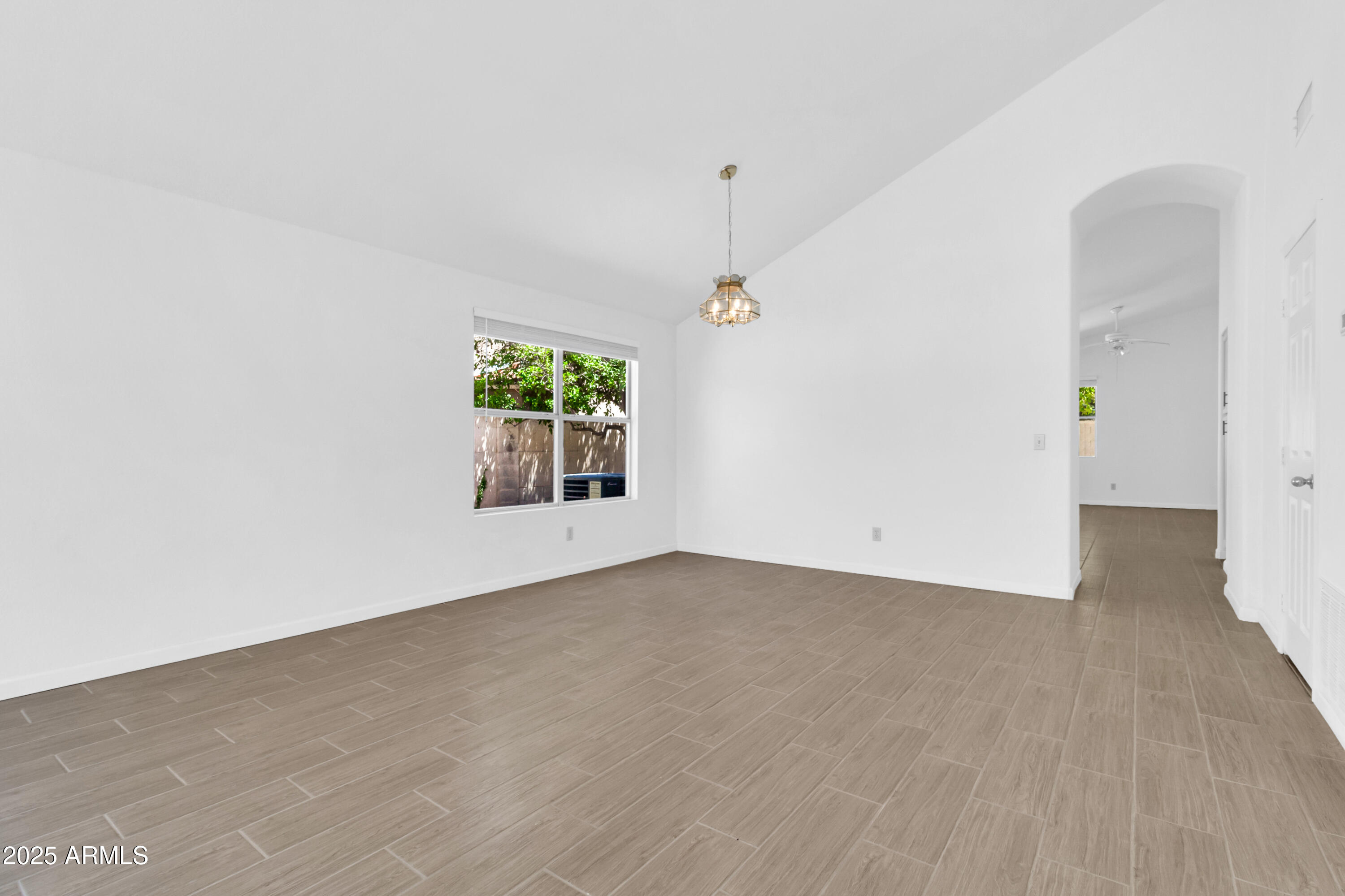 1511 West Wildhorse Court Chandler, AZ 85286 - Photo 5 of 31 an empty room with windows