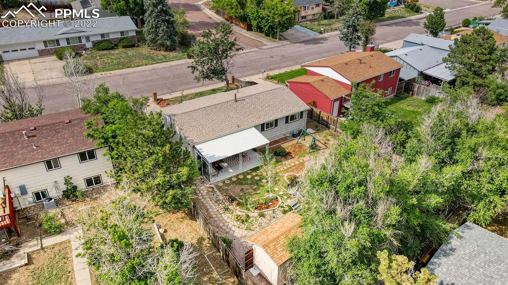 7035 Chippewa Road Colorado Springs, CO 80915 - Photo 2 of 22 an aerial view of a house with a yard