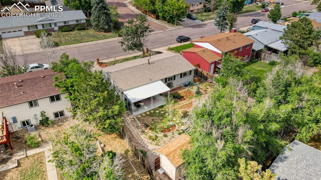 7035 Chippewa Road Colorado Springs, CO 80915 - Photo 5 of 22 an aerial view of a house with a yard