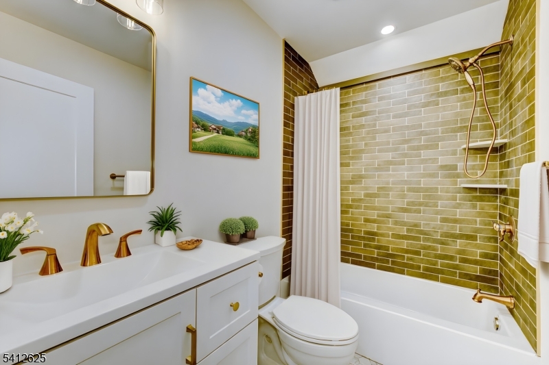 39 Old Road Ringwood, NJ 07456 - Photo 21 of 43 a bathroom with a sink a toilet and shower