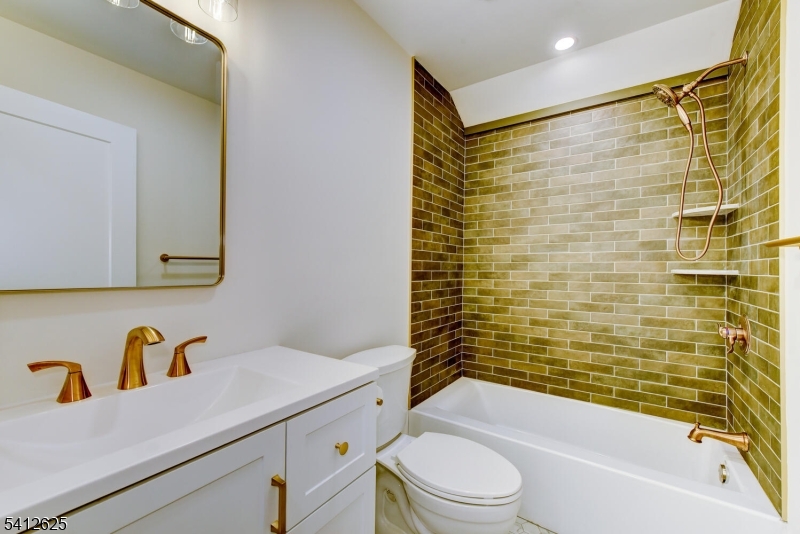 39 Old Road Ringwood, NJ 07456 - Photo 22 of 43 a bathroom with a sink and a bathtub