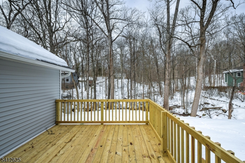 39 Old Road Ringwood, NJ 07456 - Photo 37 of 43 a view of a balcony with a pot