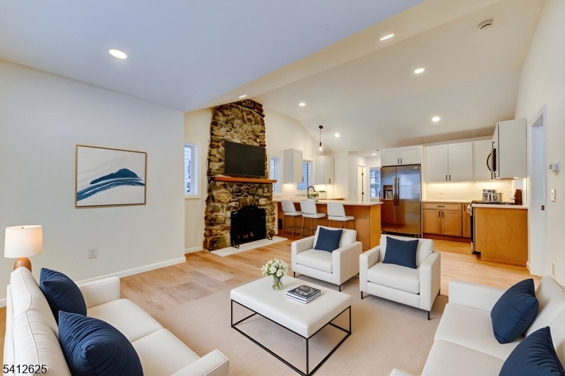 39 Old Road Ringwood, NJ 07456 - Photo 7 of 43 a living room with furniture kitchen view and a potted plant