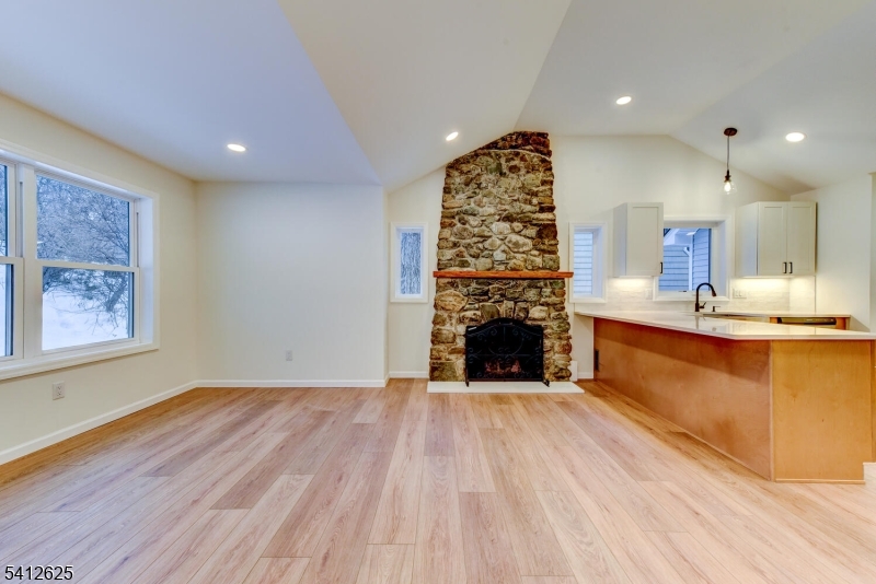 39 Old Road Ringwood, NJ 07456 - Photo 9 of 43 a view of kitchen with cabinets and wooden floor