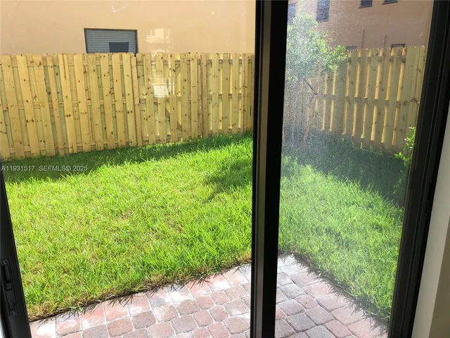 a view of a garden from a window
