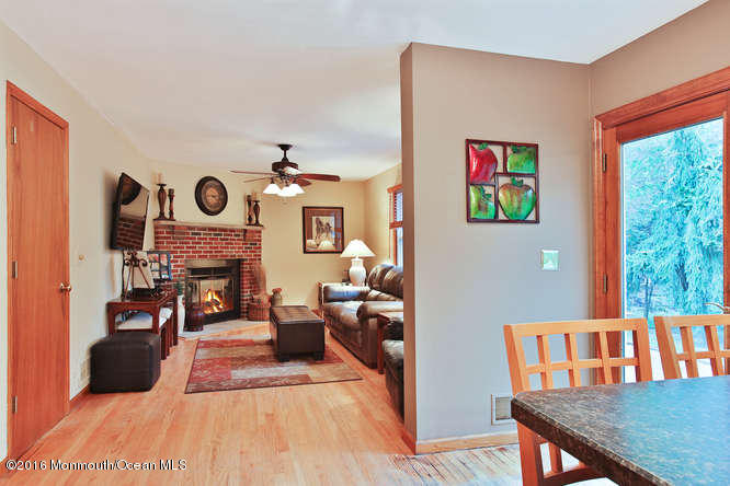 476 Diamond Road Jackson, NJ 08527 - Photo 15 of 37 a living room with furniture and a fireplace