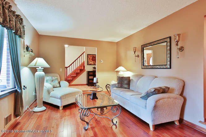 476 Diamond Road Jackson, NJ 08527 - Photo 17 of 37 a living room with furniture and wooden floor