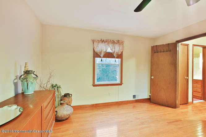 476 Diamond Road Jackson, NJ 08527 - Photo 23 of 37 a view of a bedroom with furniture and window