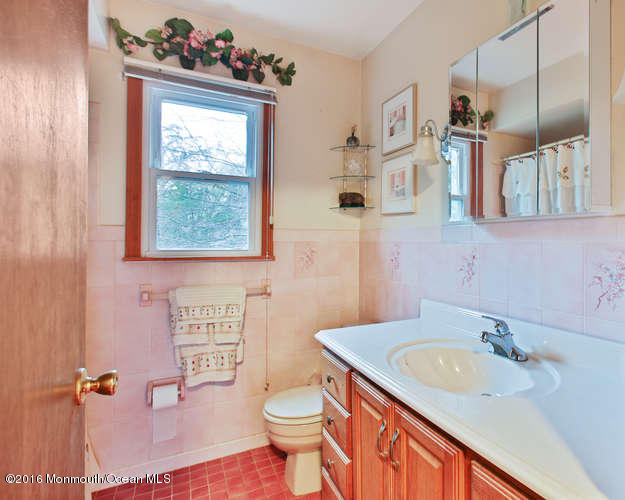 476 Diamond Road Jackson, NJ 08527 - Photo 26 of 37 a bathroom with a sink vanity mirror and toilet