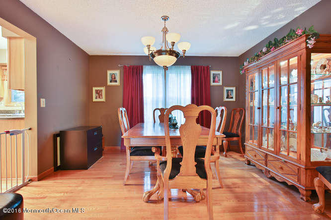 476 Diamond Road Jackson, NJ 08527 - Photo 5 of 37 a view of a dining room with furniture window and wooden floor