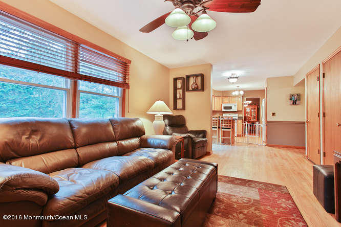 476 Diamond Road Jackson, NJ 08527 - Photo 9 of 37 a living room with furniture and a large window