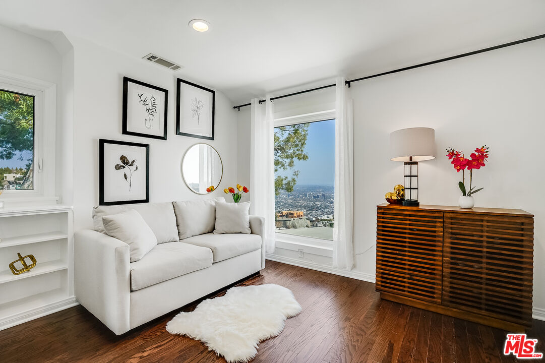8912 Appian Way Los Angeles, CA 90046 - Photo 39 of 55 a living room with furniture