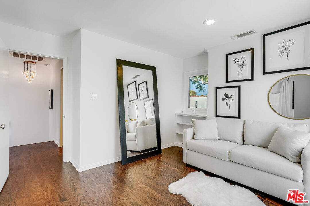 8912 Appian Way Los Angeles, CA 90046 - Photo 41 of 55 a living room with furniture and a window