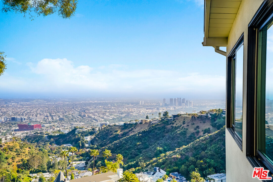 8912 Appian Way Los Angeles, CA 90046 - Photo 51 of 55 an aerial view of residential building and trees around