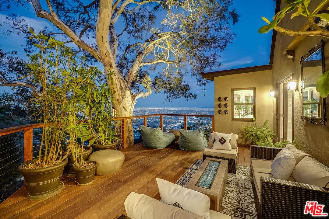 8912 Appian Way Los Angeles, CA 90046 - Photo 53 of 55 a view of a living room and a couch