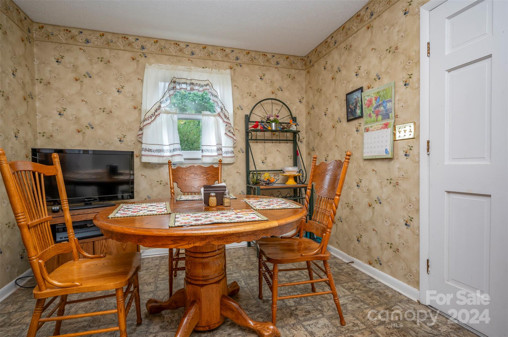 584 Baber Road Rutherfordton, NC 28139 - Photo 12 of 35 a dining room with furniture and wooden floor