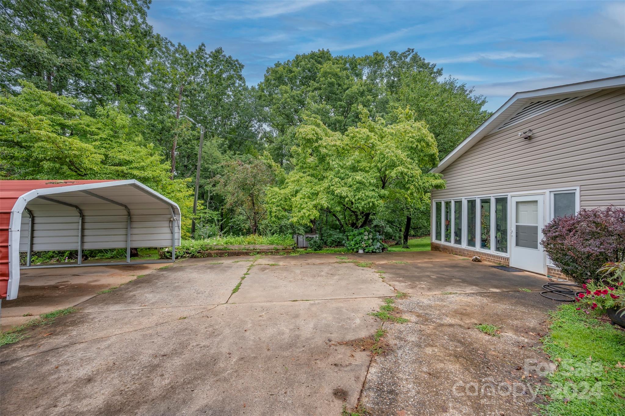 584 Baber Road Rutherfordton, NC 28139 - Photo 33 of 35 a view of a house with backyard and trees