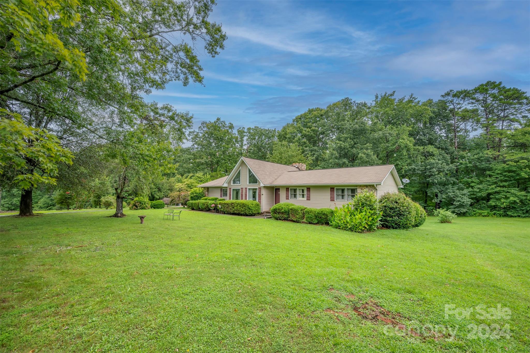 584 Baber Road Rutherfordton, NC 28139 - Photo 4 of 35 a view of a big yard with a house in the background