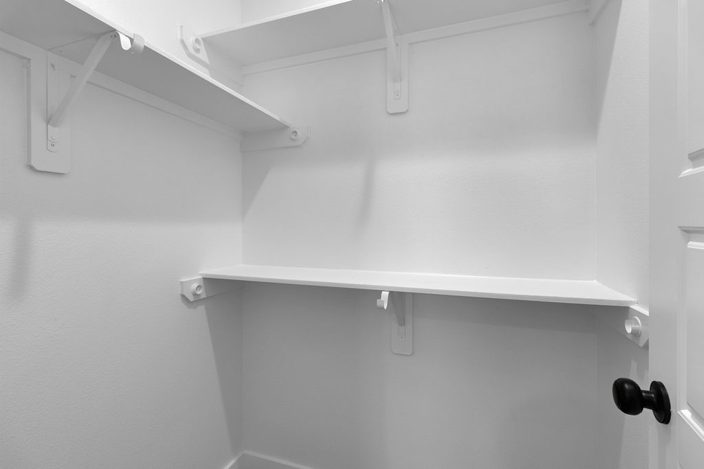 104 Runnels Street Willis, TX 77378 - Photo 25 of 27 a close up of a shower