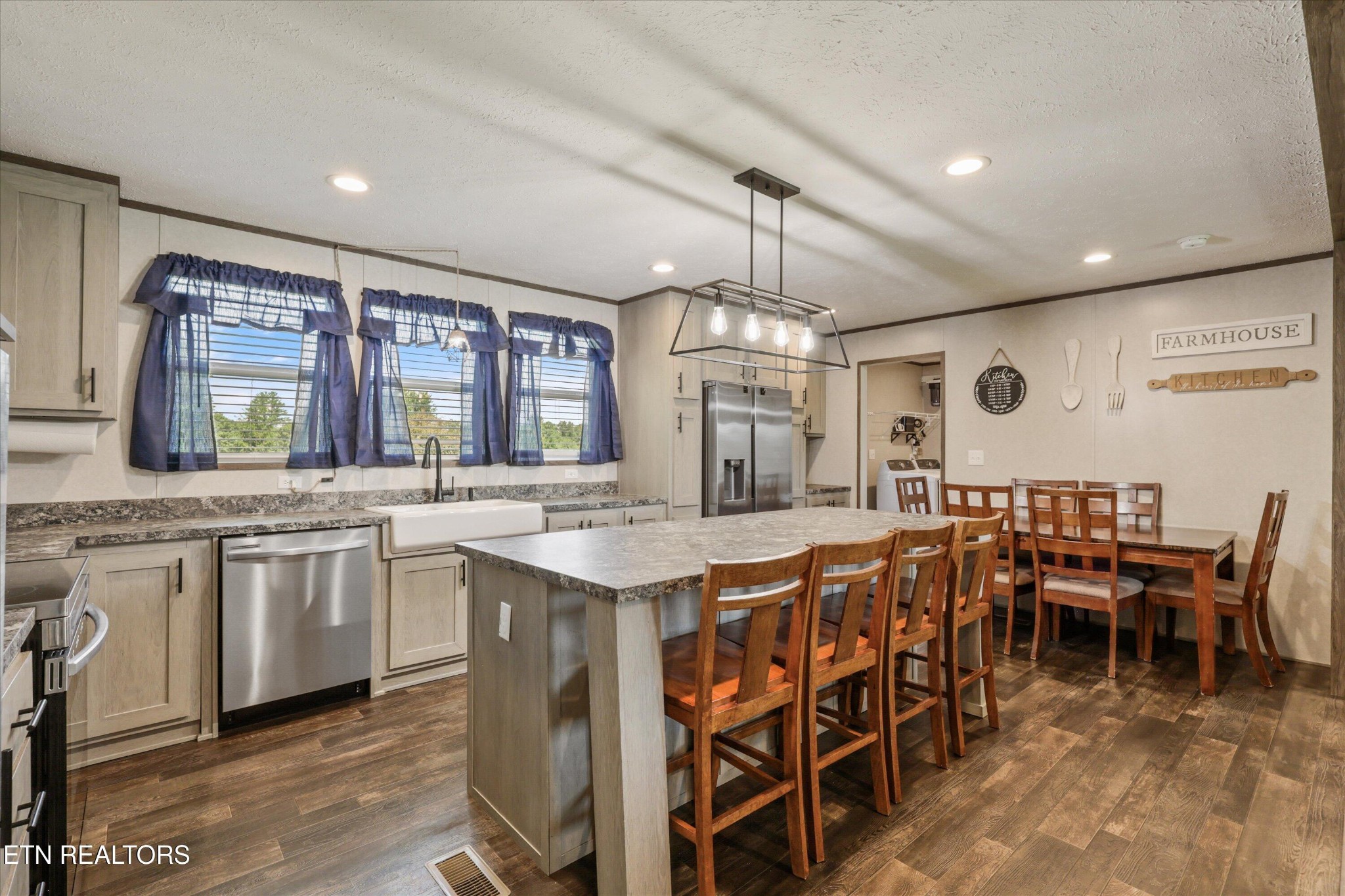 158 Frankfort Road Lancing, TN 37770 - Photo 17 of 46 a large kitchen with a table and chairs