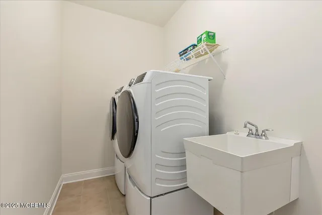 a bathroom with a sink and mirror