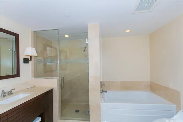 a bathroom with a bathtub and a toilet