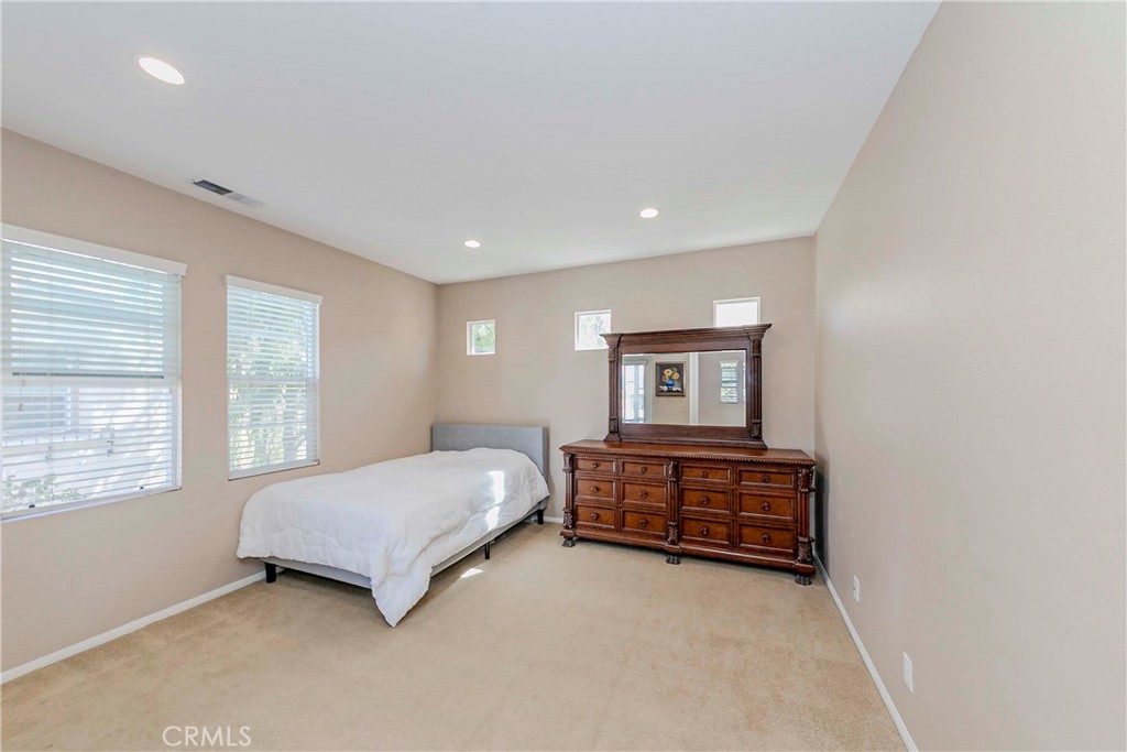 67 Canopy Irvine, CA 92603 - Photo 15 of 47 a room with a bed and window