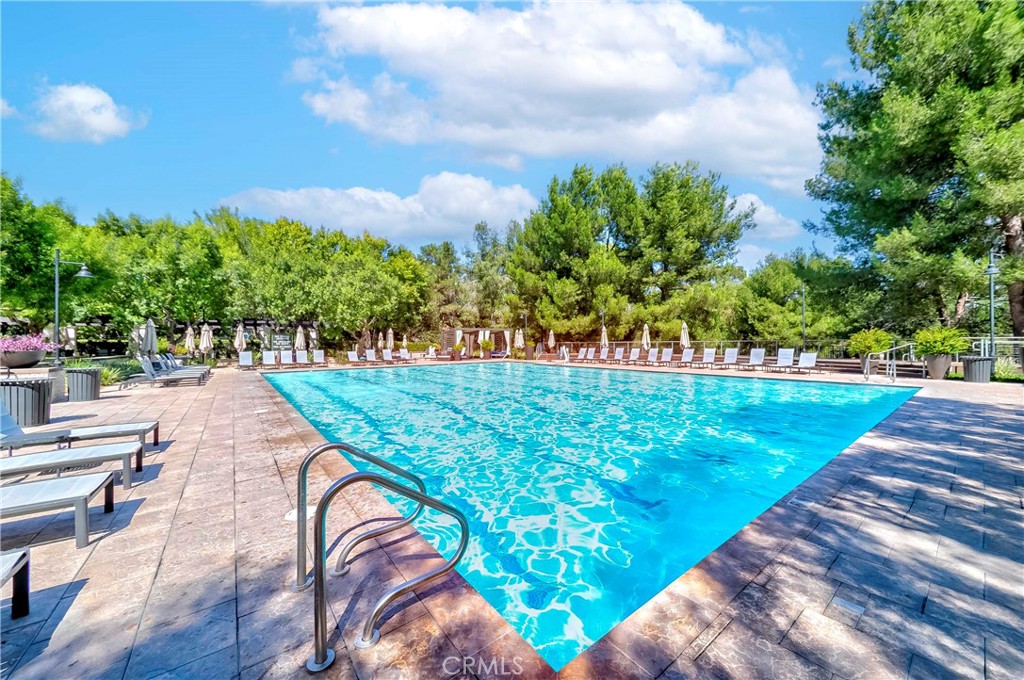 67 Canopy Irvine, CA 92603 - Photo 40 of 47 a view of a swimming pool with a yard