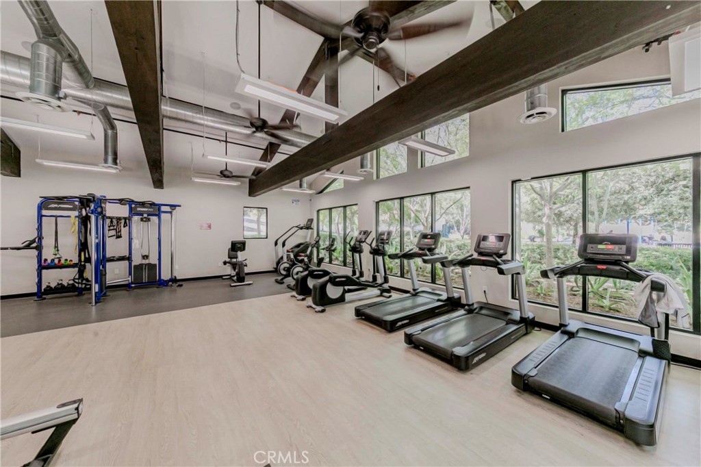 67 Canopy Irvine, CA 92603 - Photo 41 of 47 a view of a room with gym equipment