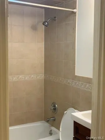 a bathroom with a sink and bathtub